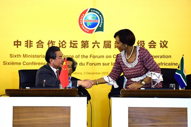 Minister of International Relations and Cooperation, Maite Nkoana-Mashabane, shakes hands with Wang Yi, Minister of Foreign Affairs of the People’s Republic of China during the Opening Ceremony of the 6th Ministerial Meeting of the Forum on China-Afr