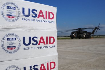 Pallets of food, water and supplies staged to be delivered. Photo: USAID (CC BY-SA 2.0)