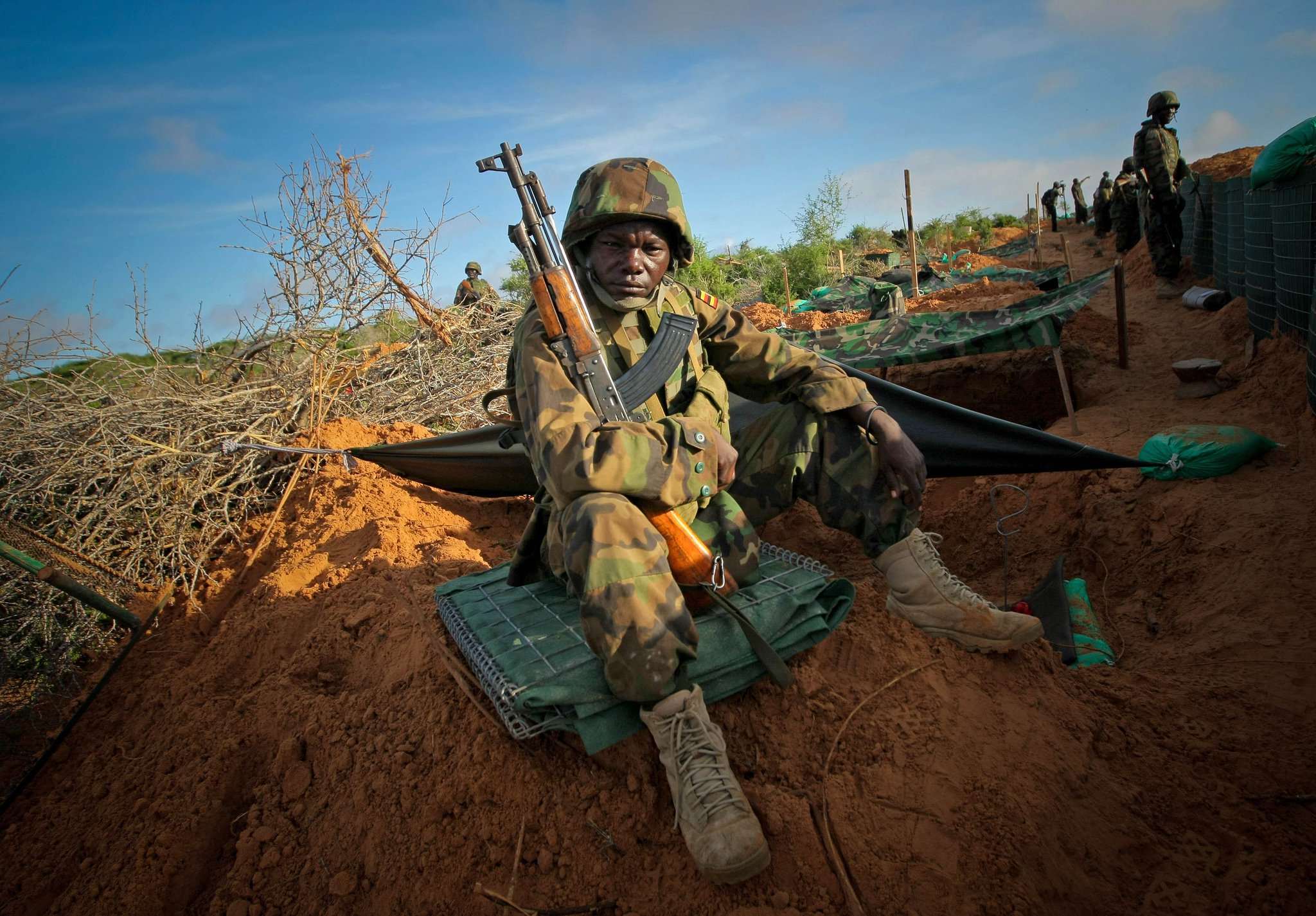 Ugandan soldiers serving with the African Union Mission in Somalia (AMISOM) man the frontline near Mogadishu, 2012 © AMISOM