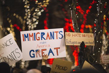 Protest signs expressing pro-immigration messages. 2017.