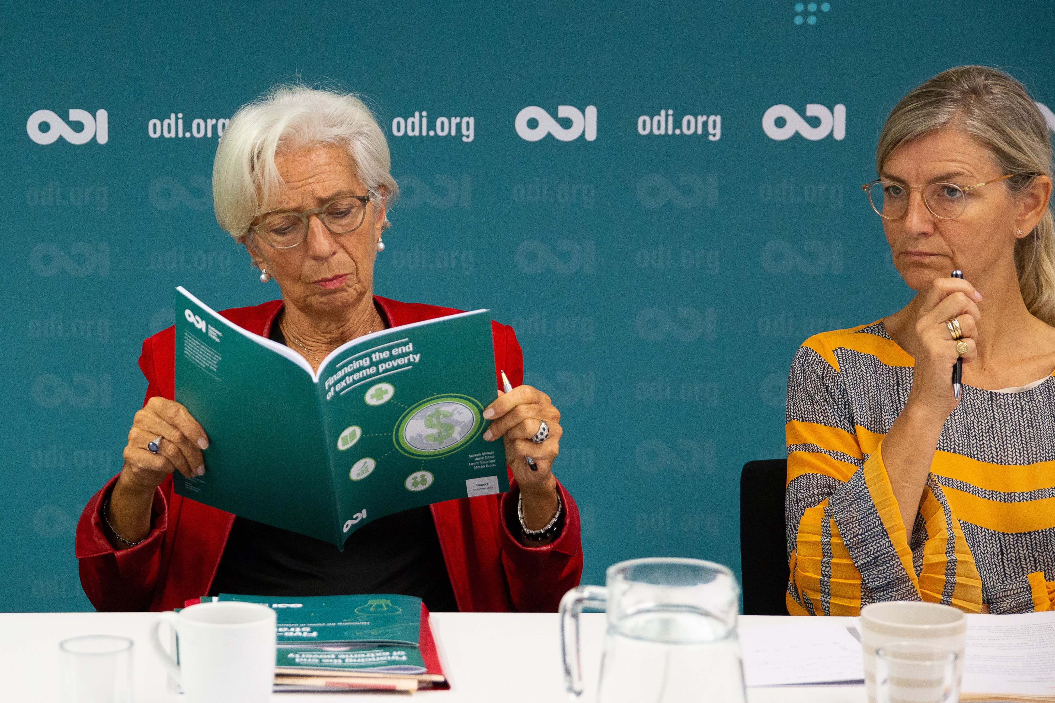 Christine Lagarde, Managing Director of the IMF, reading ODI report at a roundtable event with Ulla Tørnæs, Danish Minister for Development Cooperation
