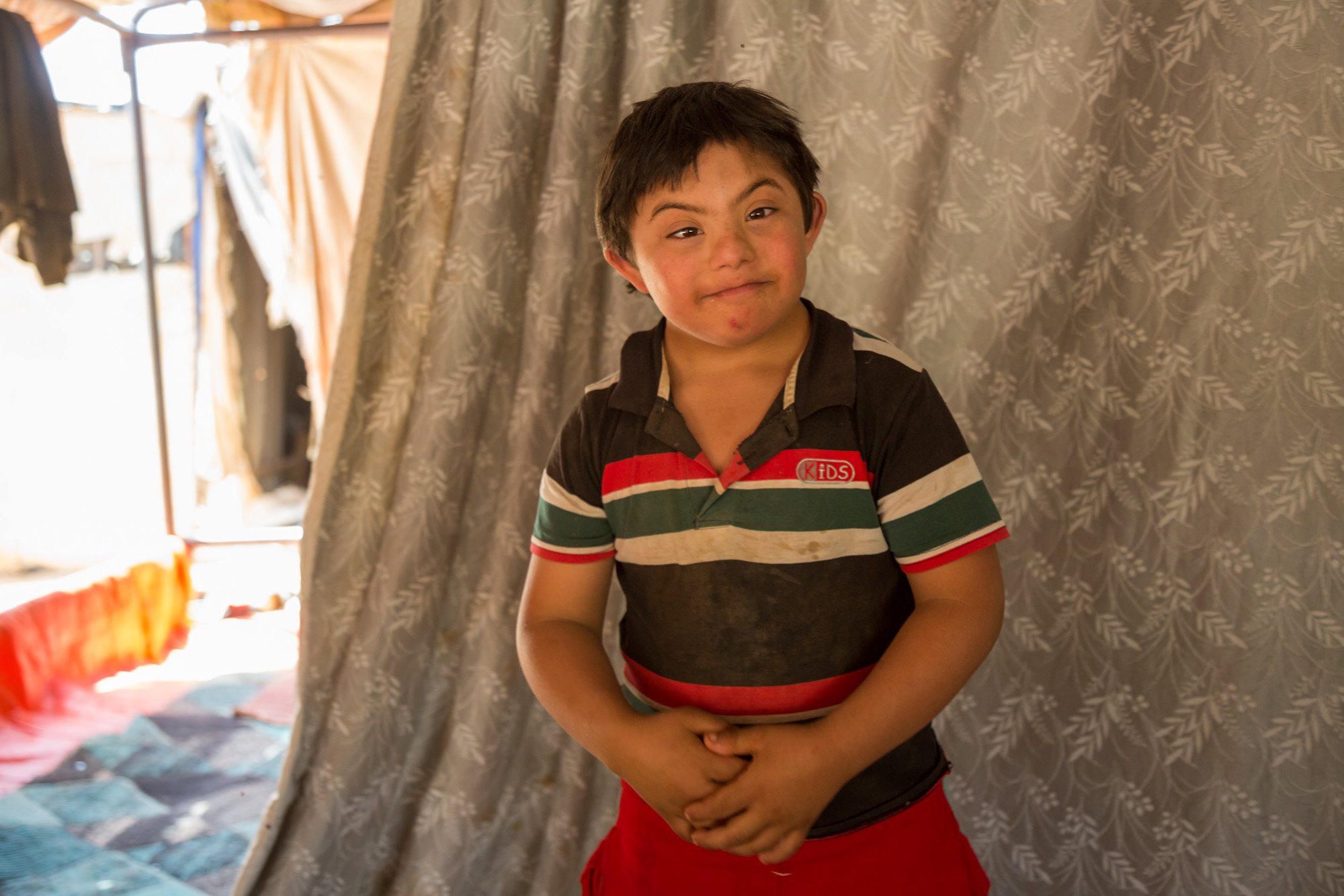 A 10-year-old Syrian refugee in Jordan with down syndrome