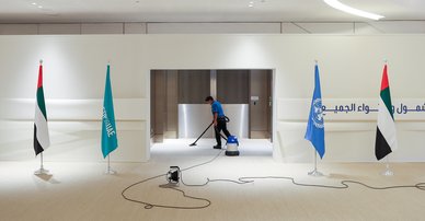 Cleaners in the Blue Zone at the UN Climate Change Conference COP28 at Expo City Dubai on December 13, 2023, in Dubai, United Arab Emirates