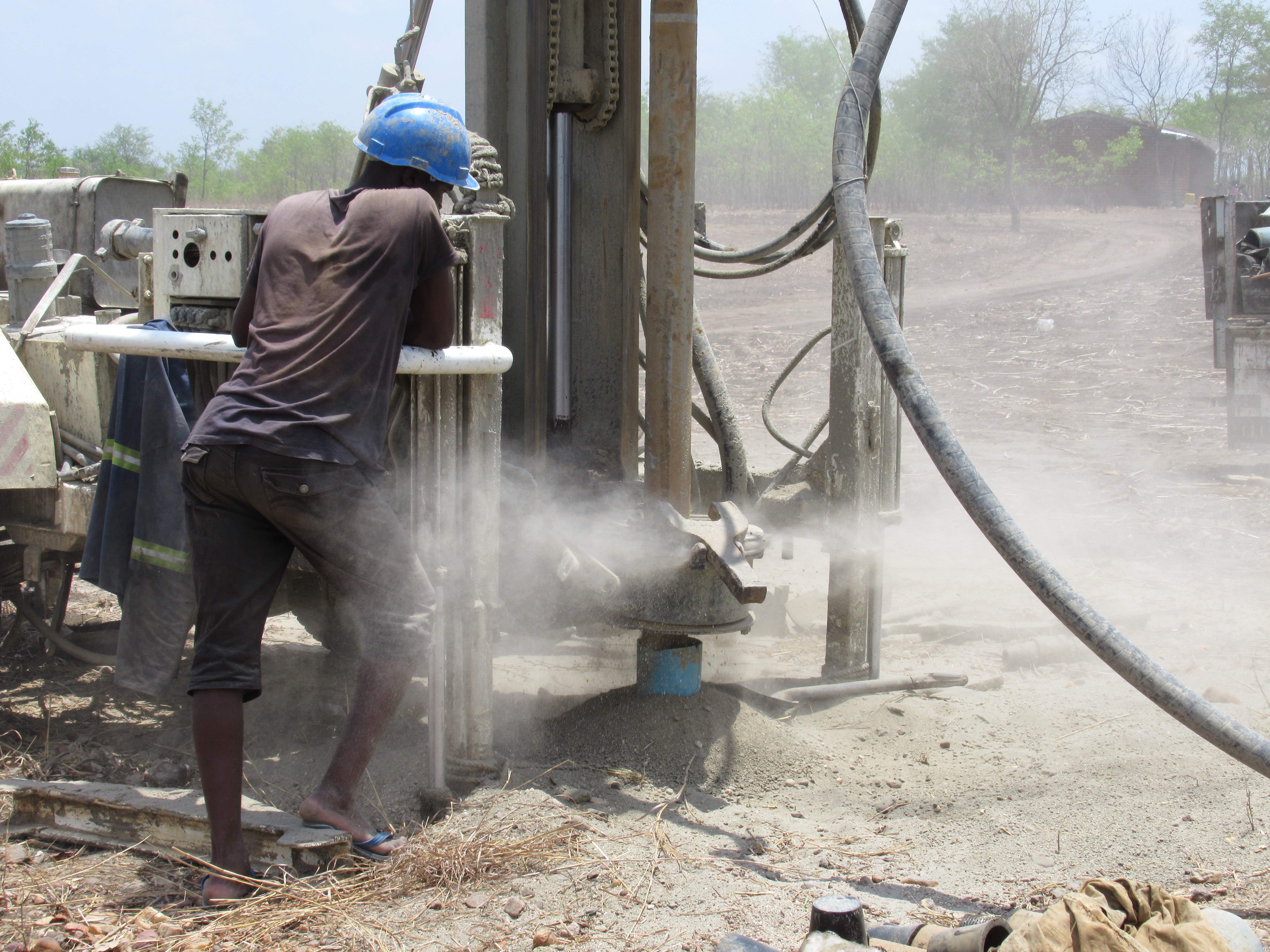 Drillers are contracted by an NGO to install new water points in a drought prone area of Balaka District, Malawi