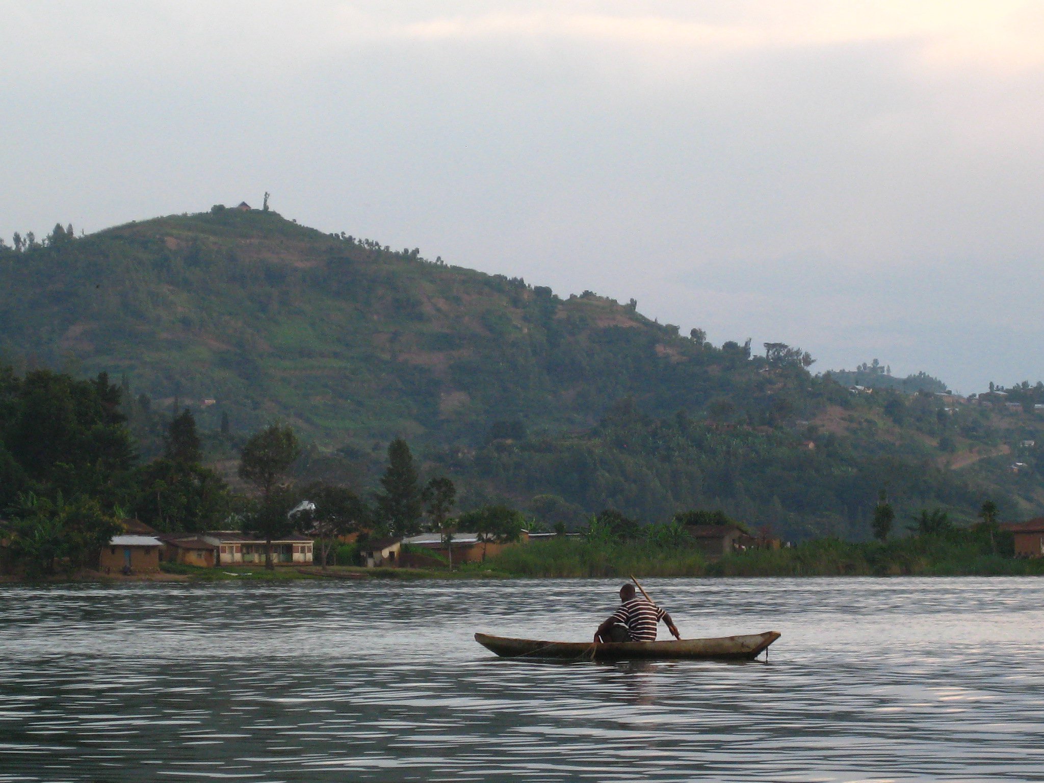 A fisherman prepares for the evening catch, near Gisenyi, Rwanda