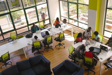Nairobi, Kenya, October 2013: Co-workers at the iHub Nairobi, a working space for technology entrepreneurs.